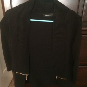 Black sweater with gold zippers